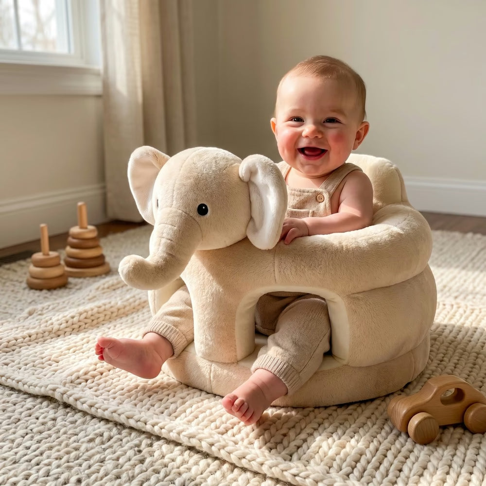 Bébé dans le transat éléphant crème