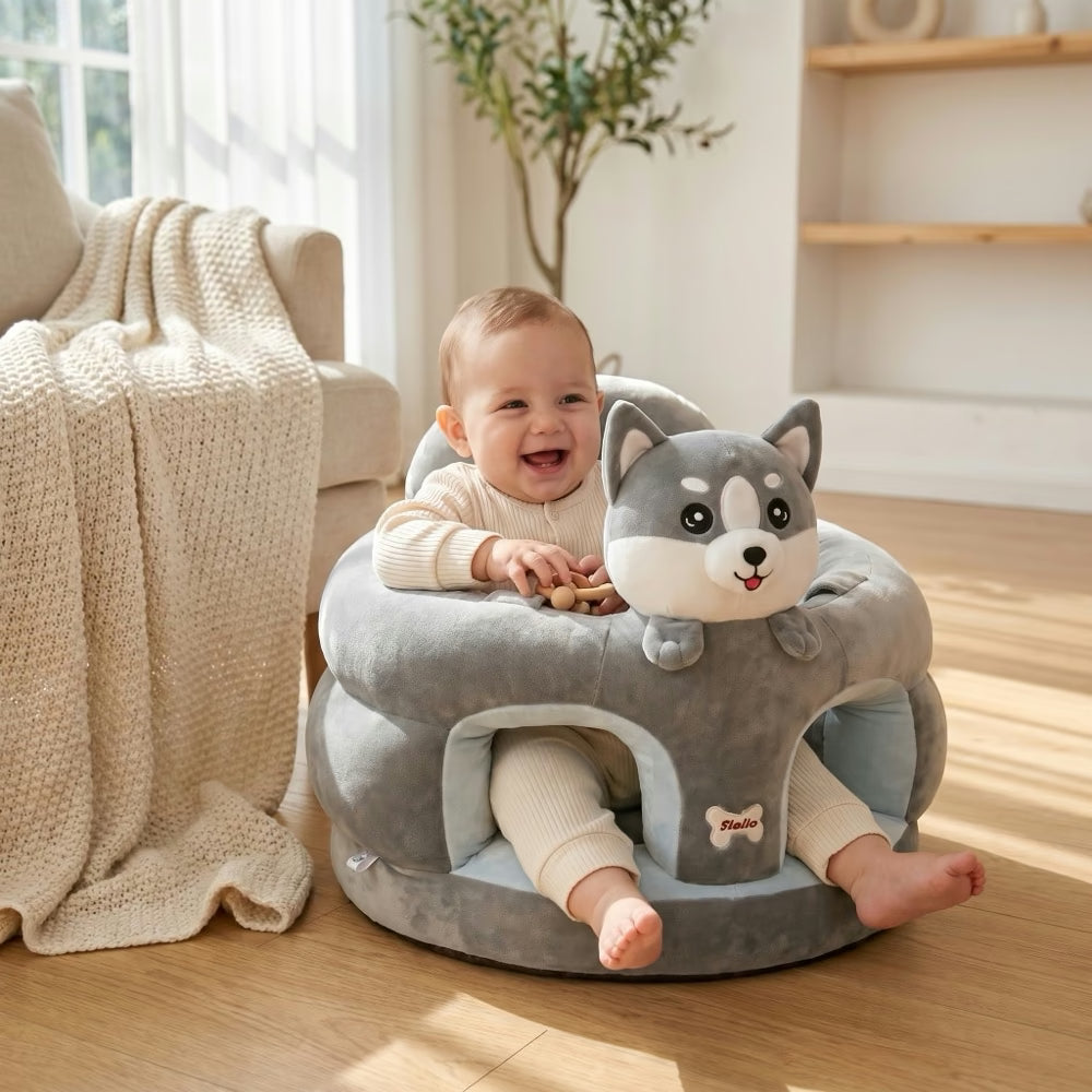 Bébé dans le transat husky gris
